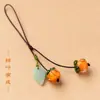 Colgante para teléfono móvil de caqui al por mayor, colgante de caqui Ruyi, colgante de vidrio para bolso, colgante de placa USB, ruyi de jade anti-pérdida
