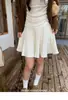 Falda corta de punto, falda plisada de línea A densa, falda de cinco puntos suave y versátil para otoño e invierno de mujer, falda para botas