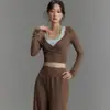 Outono/Inverno 2026 Roupa de Yoga Feminina Macia Respirável Conjunto Fitness Caimento Solto Manga Longa Esportiva Camiseta Gola Redonda