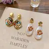 Pendientes de perla asimétricos estilo europeo y americano, pendientes de moda de nicho de alta gama, pendientes llamativos únicos y versátiles
