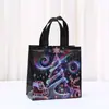 Bolsa de Tote Negra Navideña Colorida, Bolsa de Regalo, Bolsa de Llevar Impresa de Tela No Tejida al por Mayor, Bolsa de Empaque Tridimensional Laminada