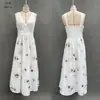 Vestido de verano europeo y americano transfronterizo, estampado floral, cuello en V, sin mangas, espalda descubierta, entallado en la cintura, vestido largo sexy para mujer