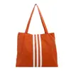 Bolso tote de lona retro, casual y espacioso para mujer, nuevo estilo 2026, bolso de hombro moderno, ligero y a la moda, adecuado para ir al trabajo