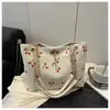 Bolsa de Ombro com Monograma Estilo Miu Versão Coreana 2025 Nova Bolsa Tote de Grande Capacidade Bolsa Casual de Axila Bolsa de Mão para Mulheres