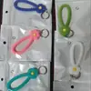 Cordão de celular de fábrica pingente de flor fofa pulseira de corda de cânhamo de silicone pingente chaveiro silicone anti-queda mão
