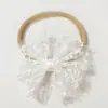Diadema de lazo para niños transfronteriza europea y americana Nueva diadema elástica para bebé Accesorios elásticos finos y suaves para el cabello de bebé