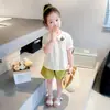 Conjunto Infantil 2026 Novo Estilo Moda Coreana para Crianças, Menininha Gola Boneca Shorts Florais Vazados Conjunto de Duas Peças Tendência