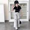 Ropa Infantil Nueva y Elegante para Niñas Verano 2026, Camiseta con Letras Estilo Coreano, Corte Ajustado, Crop Top, Diseño Cruzado, Manga Corta