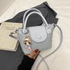 Bolsa Feminina Color Block de Verão Niche Pedido Estrangeiro 2026 Nova Moda Versátil Bolsa Transversal Tendência Pequena Quadrada de Mão