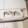Gabinete de baño grifo estilo europeo dorado doble lavabo juego de cuatro piezas extraíble dividido combinación Lavabo grifo de tres-cuatro agujeros