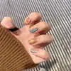 Armadura de mano sentido avanzado hecho a mano ins explosiones diamante roto mariposa uña piezas de uña al por mayor uñas portátiles