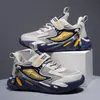 Sapatos esportivos masculinos atacado primavera e outono temporada escolar tênis de corrida crianças médias e grandes malha couro sapatos casuais antiderrapantes resistentes ao desgaste