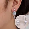 Nuevos Pendientes Largos de Estilo Transfronterizo con Diseños de Girasol y Fuegos Artificiales, Presentando una Sensación Dinámica y Lujosa, Pendientes de Lujo Ligero y Versátiles
