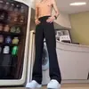 Pantalones de vestir rectos negros con caída de alta gama, Pantalones ligeramente acampanados de seda helada para hombre, Pantalones casuales de traje para exportación de primavera