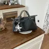 2026 Bolso Cruzado de Nuevo Diseño de Nicho para Mujer Gran Capacidad Superficie Suave Bolso para Viajes Cotidianos Versátil Bolso de Hombro con Colgante de Estrella