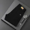 Jeans Ajustados Skinny Elásticos de Nuevo Estilo Primavera 2026 para Hombre, Algodón Puro, Estilo Europeo y Americano, Pantalones Largos Casuales Blancos Sencillos