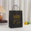 Bolso Estampado en Caliente con Estampado de Luna Bolsa de Papel Kraft para Compras en Centro Comercial Bolsa Negra para Empaque de Regalo de Fiesta
