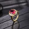 Nuevo anillo abierto elegante de alta gama con gema de turmalina roja de imitación ovalada, color oro para mujer.