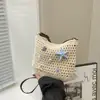Bolsa de punto hueca de nicho de comercio exterior para mujer 2026 Nueva bolsa cruzada versátil casual, bolsa tipo cubo tejida, bolsa para teléfono