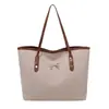 Bolsa de ombro de grande capacidade para o dia a dia, versátil para primavera e verão, bolsa tote estilosa para mulheres, modelo novo de alta qualidade 2026, moderna