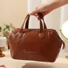 2026 Nova Bolsa de Maquiagem Portátil Estilo Francês de Luxo Leve, Amiga para Viagem, Alta Estética, Bolsa de Armazenamento de Cosméticos de Grande Capacidade