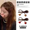 2025 Novo Grampo de Cabelo Metálico Estilo Coreano com Laço em Forma de Coração Prendedor Lateral Acessório de Cabelo Doce e Fofo