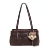 El artículo de moda popular de este otoño e invierno es el bolso para la axila de mujer, nuevo bolso de hombro versátil y elegante 2026, bolso baguette de gamuza