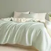 Colcha de verano fresca estilo Muji clase A de seda helada lavada con agua juego de cuatro piezas para dormitorio colcha de verano lavable a máquina colcha de aire acondicionado regalo colcha fina