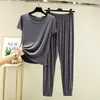 Nuevo conjunto de verano fino de modal con manga corta y pantalón largo para mujer, ropa de casa, color liso, estilo simple, se puede usar para salir, conjunto de dos piezas