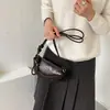 Bolsas de nicho populares deste ano 2026 nova tendência de moda bolsas femininas estilosas bolsas transversais de cor sólida bolsas de bolinho elegantes