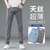 Fotos reales de jeans gruesos, elásticos, de corte ajustado, pierna recta para hombre para otoño e invierno, un pantalón largo casual moderno y versátil para hombres jóvenes