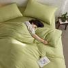 Juego de cama de cuatro piezas de jacquard de algodón clase a Algodón puro Simple Color puro Funda de edredón Sábanas Juego de tres piezas Cama Sábanas Universal para todas las estaciones