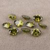 Wuzhou circonita cúbica artificial ovalada en forma de huevo verde oliva circonio venta al por mayor circonita piedra desnuda anillo cara gema CZ piedra a juego