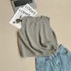 Chaleco de color liso simple estilo coreano con múltiples botones, holgado y suave, adecuado para usar en capas con prendas de punto y cárdigans en primavera y otoño
