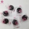 Ventas directas de fábrica Mascarilla de carbón de bambú Beiyu en grano comprimido empaque individual película negra caramelo comprimido papel para mascarilla DIY