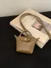 2025 Nova Bolsa de Bolinho Mini Bolsa para o Dia a Dia Bolsa de Mão com Alça Curta Bolsa de Ombro Bolsa Transversal Estilo de Nicho Luxuoso de Alta Qualidade