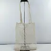 Moda Nueva Primavera y Verano 2026 Bolso Versátil Tejido Hueco Bolso de Red Bolso de Hombro Bolso Tote de Gran Capacidad para Mujer