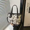 Bolso Cruzado Simple de un Solo Hombro 2026 Primavera Diseño de Nicho Bolso Tipo Cubo Casual Textura Nuevo Estilo Bolso Personalizado para Mujer