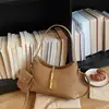 Bolsa pequena retrô de alta qualidade feminina 2026 nova moda bolsa transversal versátil bolsa de mão super quente estilo saco de balde