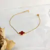 Pulsera de trébol de cuatro hojas transfronteriza para mujer, joyería de cuerda para la mano, accesorios, pulsera, adorno para la mano, accesorio de mano de alta gama de lujo ligero europeo y americano