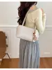 Bolso de mano casual de estilo coreano transfronterizo para mujer, nuevo modelo 2026, alta calidad, elegante, versátil, bolso de hombro para debajo del brazo