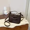 Nova coleção feminina 2026: Bolsas de palha tecidas, de cor sólida, estilo retrô e design exclusivo, modernas e estilosas para o uso diário, incluindo bolsas de ombro
