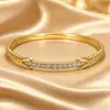 Bestseller transfronterizo de AliExpress: Pulsera de doble nudo con circonitas para mujer, joyería minimalista de lujo ligero de nicho, disponible para compra al por mayor