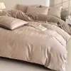 Juego de ropa de cama de cuatro piezas jacquard de algodón puro Clase A sábana 100% algodón puro funda de edredón juego de tres piezas ropa de cama ropa de cama estilo falda de cama