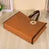 Loja de Roupas Femininas da Moda Camélia Bolsa Tote Não Tecida Publicidade Ecológica Em Estoque Bolsa de Compras Atacado de Roupas