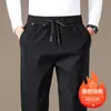 Pantalones rectos con cintura elástica para hombre, pantalones casuales de moda y versátiles para otoño/invierno 2026 para hombres de mediana edad y mayores, pantalones de hombre de alta gama