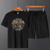 Traje de Seda Gelada de Verão 2022 Masculino Solto Tamanho Grande Camiseta Casual Esportiva Masculina Manga Curta Calça de Cinco Pontos Conjunto de Duas Peças