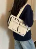Bolso de lona con estampado de letras y múltiples bolsillos, modelo nuevo 2026, bolso de mano de alta gama, bolsa de compras, bolso de hombro, bolso de mano para el día a día