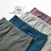 Pantalones cálidos de terciopelo de doble cara para hombre, otoño e invierno, rodillera, aislamiento térmico, corte casual sin costuras, pantalón largo para base