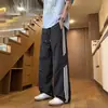 Pantalones deportivos de pierna ancha a rayas estilo americano 2026, seda de hielo de secado rápido, pantalones largos holgados de verano para hombre, pantalones casuales de pierna recta, marca de moda